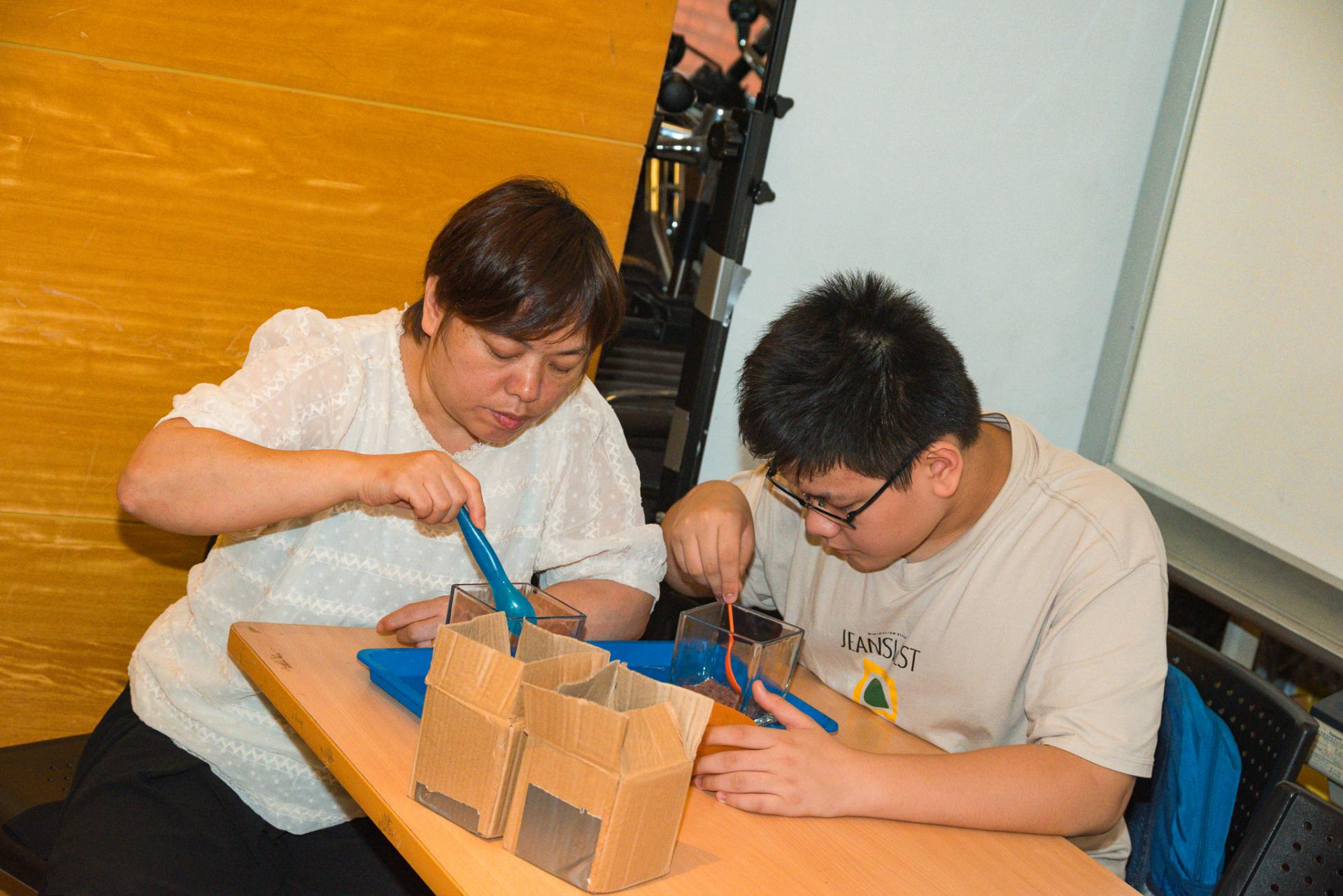 The Parent-Teacher Association of our school, in collaboration with the PTA of Shek Lei St. John's Catholic Primary School, organized a 'Micro-Ecosystem Glass Terrarium Workshop' at Noah's Ark, Ma Wan, and a visit to the '1868 Cultural and Arts District.'27 The Parent-Teacher Association of our school, in collaboration with the PTA of Shek Lei St. John's Catholic Primary School, organized a 'Micro-Ecosystem Glass Terrarium Workshop' at Noah's Ark, Ma Wan, and a visit to the '1868 Cultural and Arts District.'-27