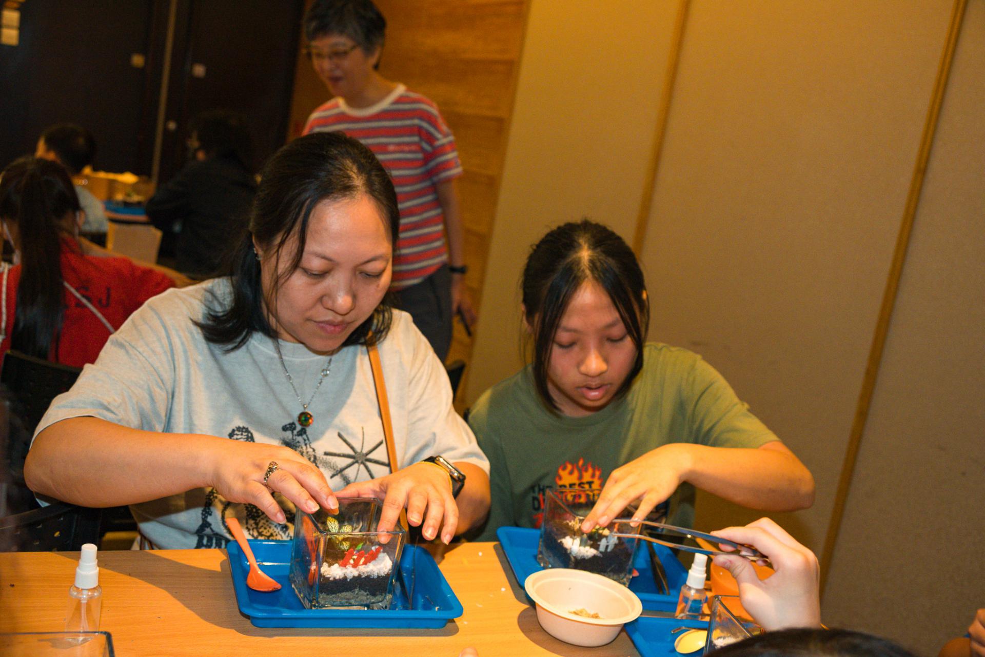 The Parent-Teacher Association of our school, in collaboration with the PTA of Shek Lei St. John's Catholic Primary School, organized a 'Micro-Ecosystem Glass Terrarium Workshop' at Noah's Ark, Ma Wan, and a visit to the '1868 Cultural and Arts District.'44 The Parent-Teacher Association of our school, in collaboration with the PTA of Shek Lei St. John's Catholic Primary School, organized a 'Micro-Ecosystem Glass Terrarium Workshop' at Noah's Ark, Ma Wan, and a visit to the '1868 Cultural and Arts District.'-44